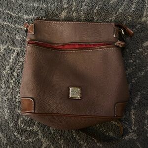 Brown and red interior dooney and Burke crossbody bag. Send me an offer